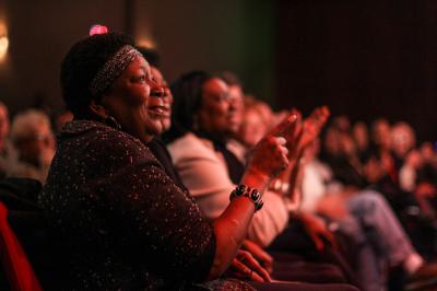 Audience members enjoying performance on the Mendel Center Mainstage