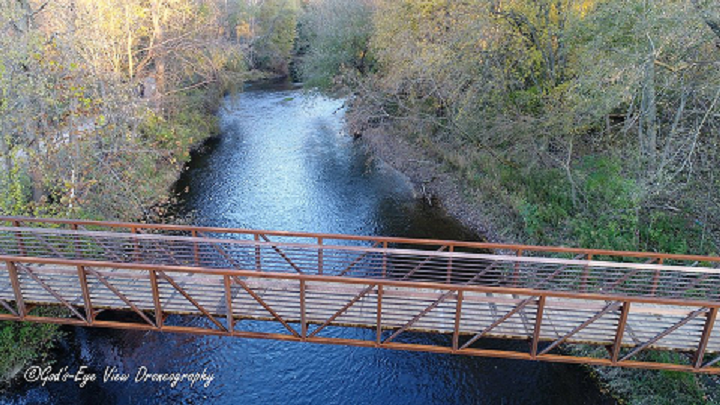 Overhead view of river and pedestrian bridge to island