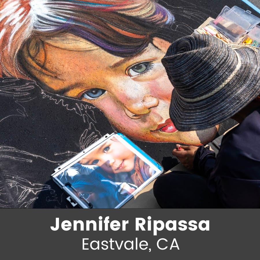 Artist working on chalk art piece